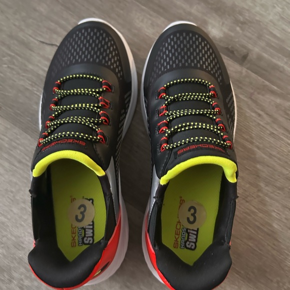 Skechers Black and Red Sneakers with Yellow Lining - Picture 1 of 5